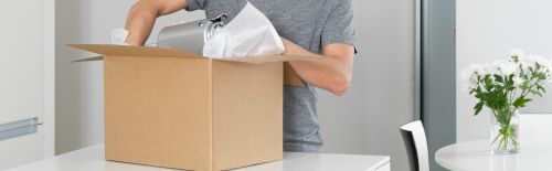 Man unpacking a parcel